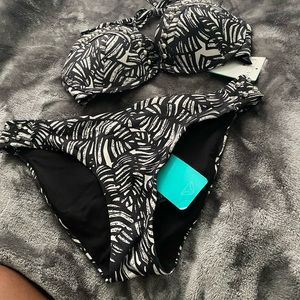 Black and White swimsuit w/studs on the sides